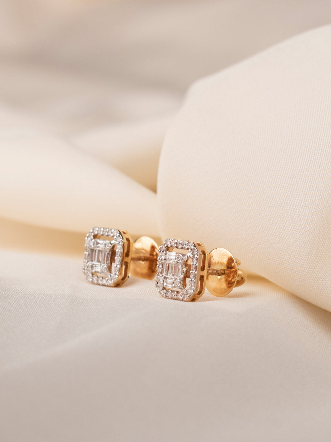 18K Gold and Baguette Diamond Earrings with an Emerald Cut Halo