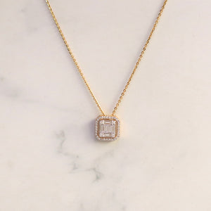 18K Gold and Baguette Diamond Pendant in Emerald Cut Setting with Halo